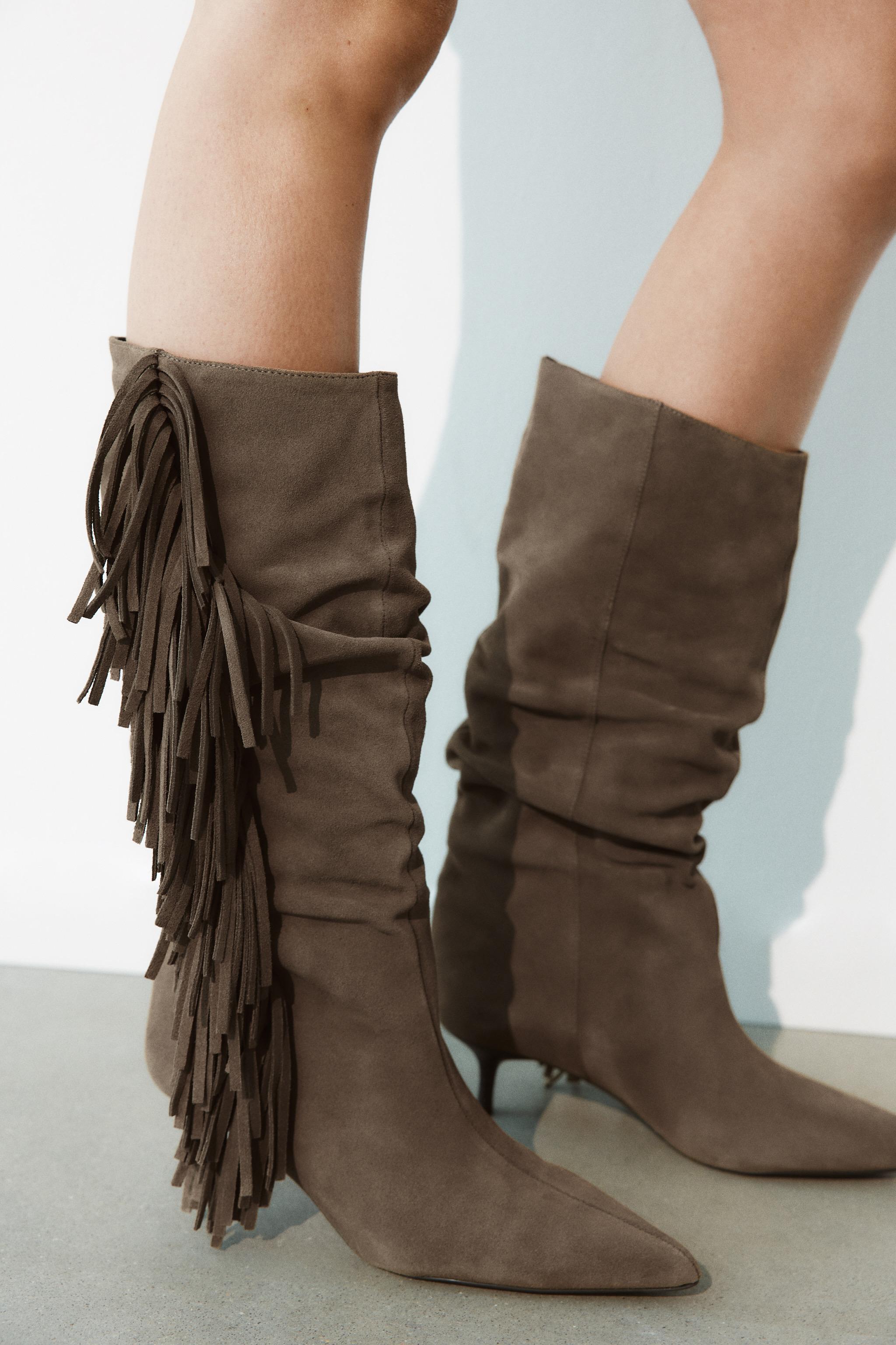 BOTTES À FRANGES EN CROÛTE DE CUIR